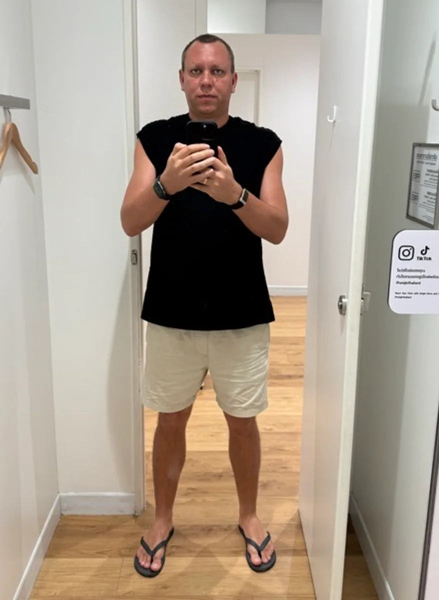 The founder's real mirror selfie in a fitting room.